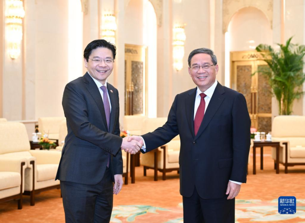 李強會見新加坡副總理兼財政部長黃循財