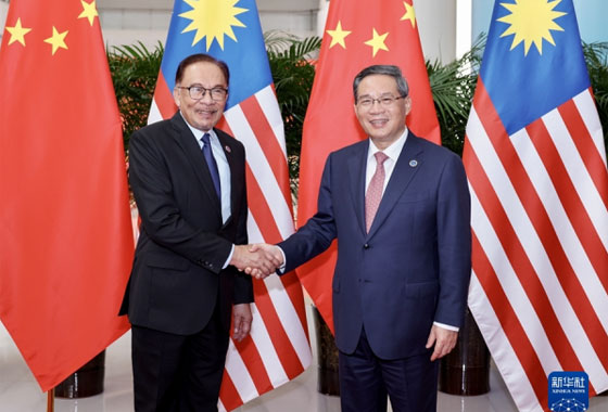 李強會見馬來西亞總理安瓦爾