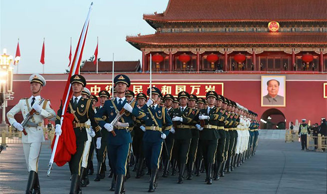 Flag-raising ceremony held at Tian'anmen Square to celebrate National Day